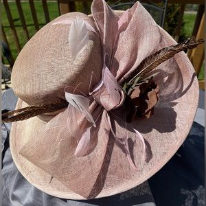 This hat is a Dusty Rose in color size Small